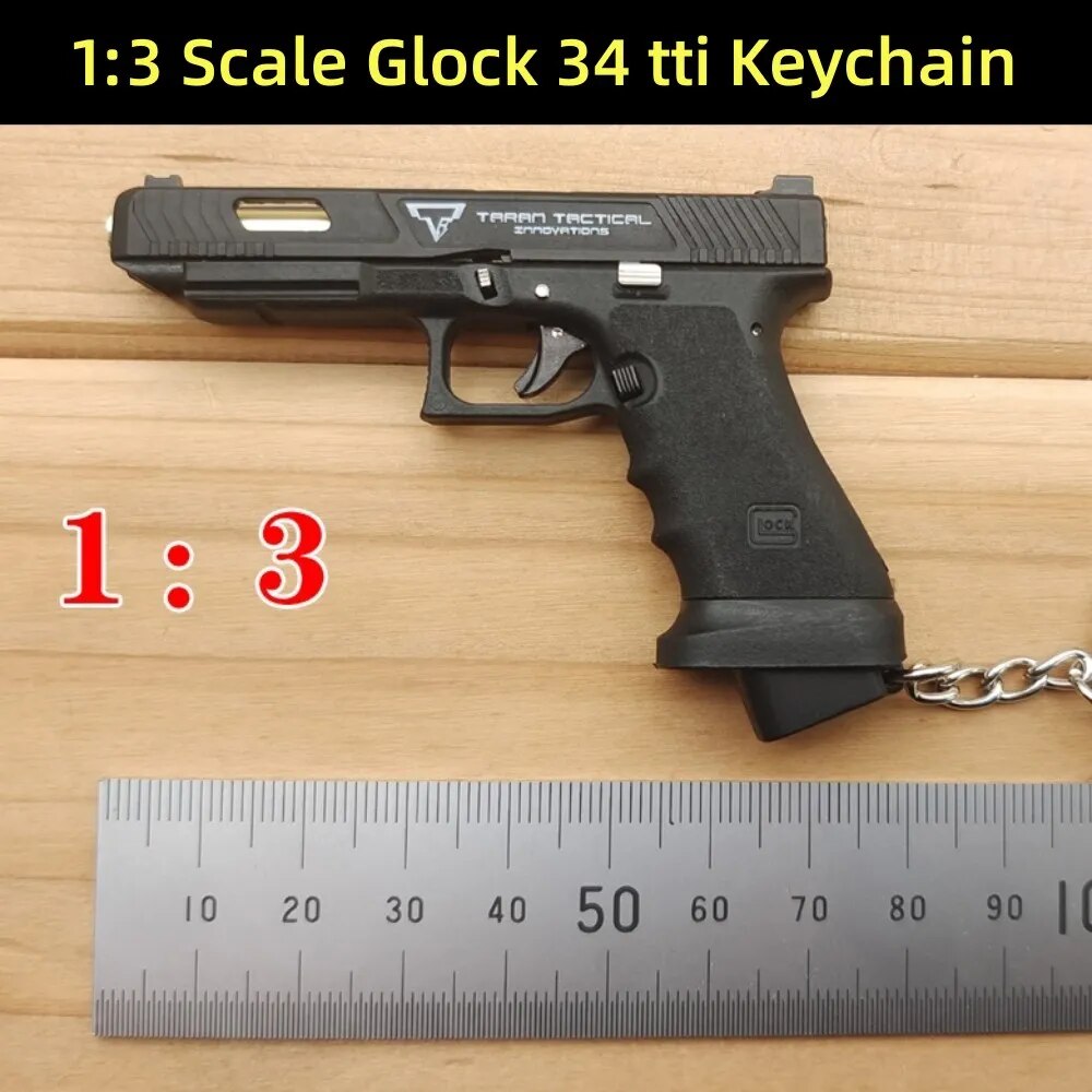 Alloy Empire Mini Pistol Keychain Toy - 2023 New Taran Tactical TTI Glock G17 G34 1:3 Scale with Shell Ejection and Free Assembly - Fidget Toy Gun